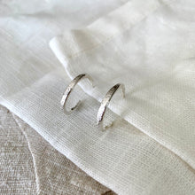 Load image into Gallery viewer, Rustic textured slim medium hoop earrings in recycled silver.